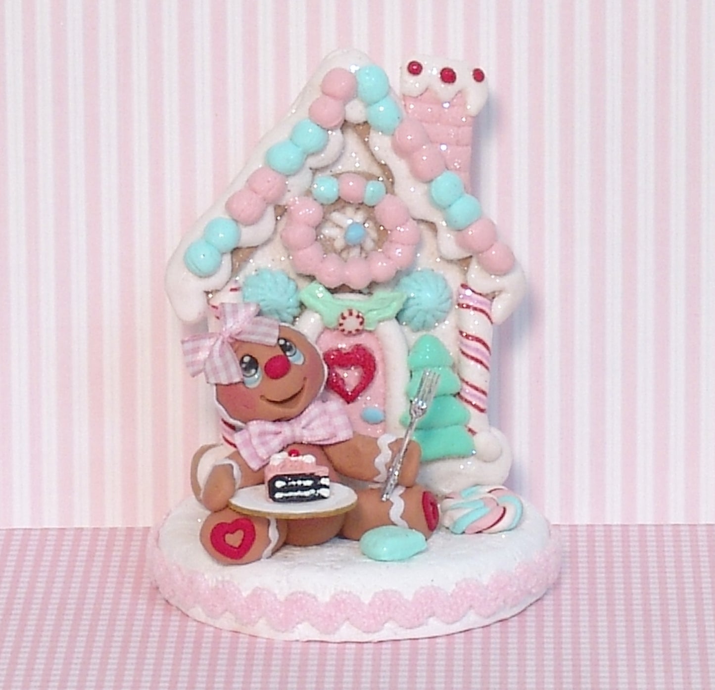 Gingerbread Clay Figure with Pastel Gingerbread House and Cake