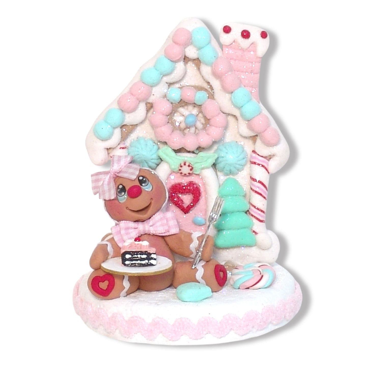 Gingerbread Clay Figure with Pastel Gingerbread House and Cake