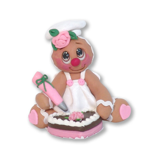 Valentine Gingy Decorating a Heart Cake