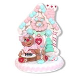 Gingerbread Clay Figure with Pastel Gingerbread House and Cake